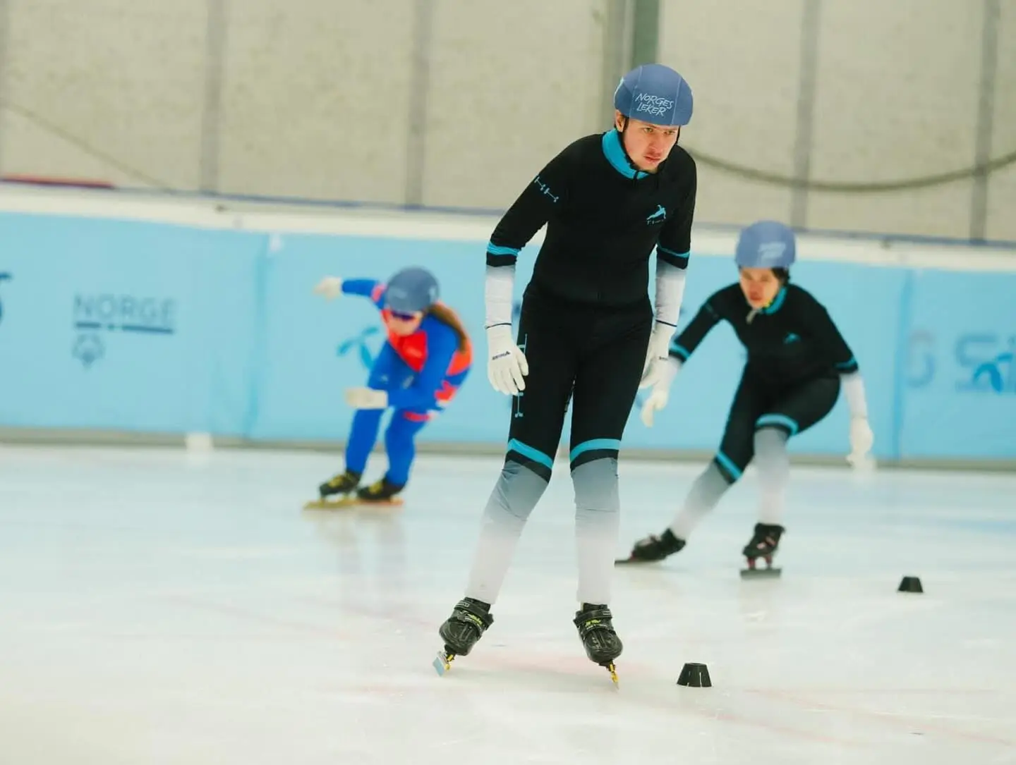 A thrilling moment in short track speed skating para-skating racing, with athletes navigating tight turns and pushing their limits on the ice.